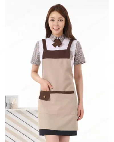 Đồng phục tạp dề chữ H màu be phối viền túi và dây đeo màu nâu 